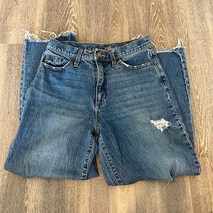 Distressed “vintage straight” jeans